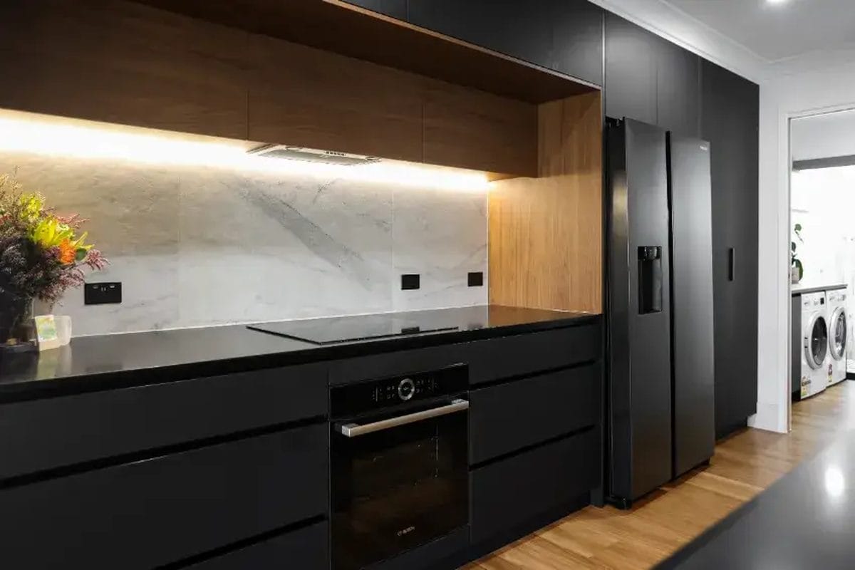 Open kitchen with adjacent laundry